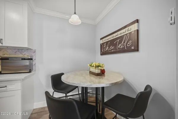 a view of a dining room with furniture