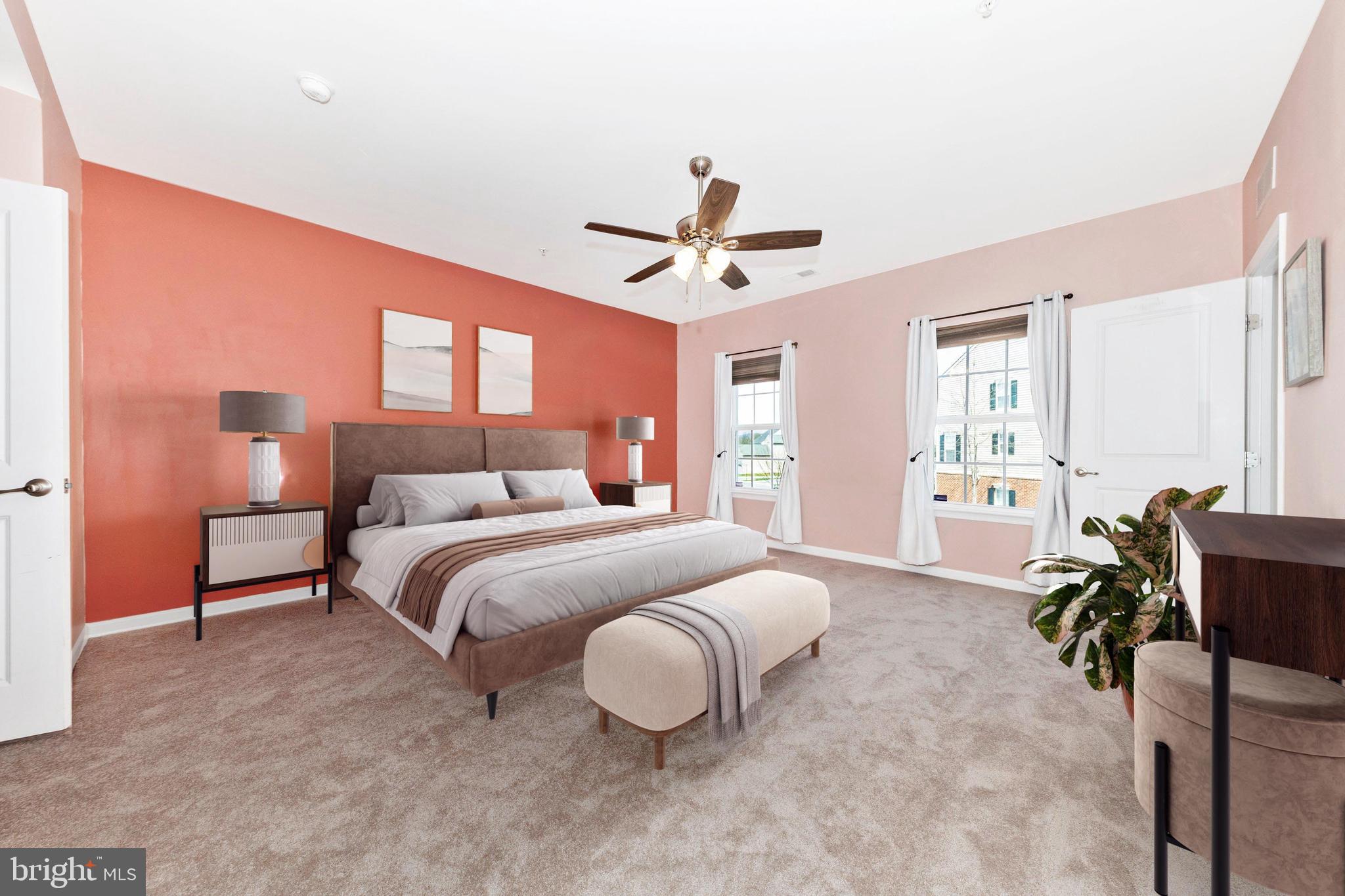 5043 Small Gains Way Frederick, MD 21703 - Photo 12 of 44 a bedroom with a bed and a chandelier