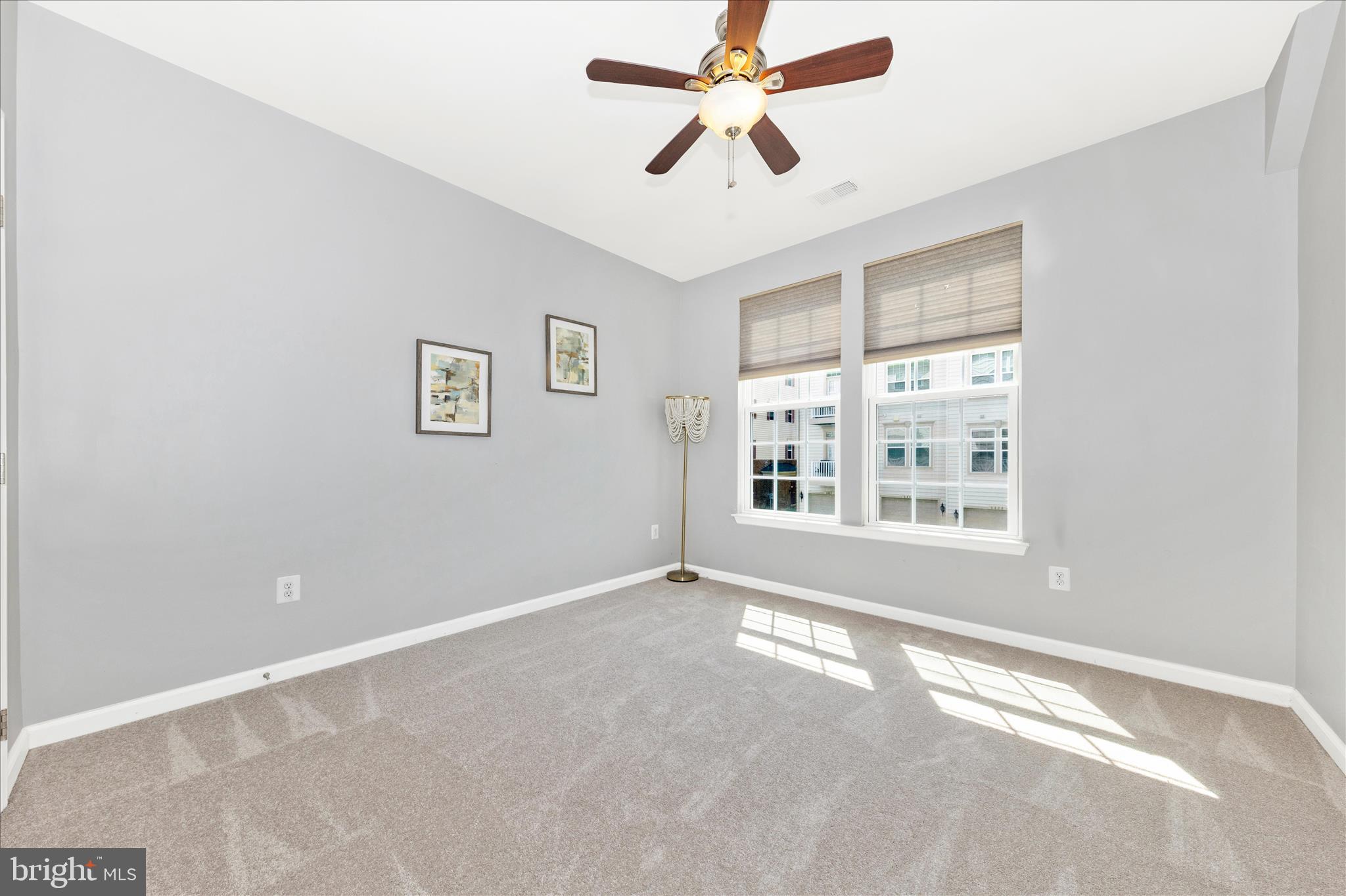 5043 Small Gains Way Frederick, MD 21703 - Photo 22 of 44 a view of an empty room with a window