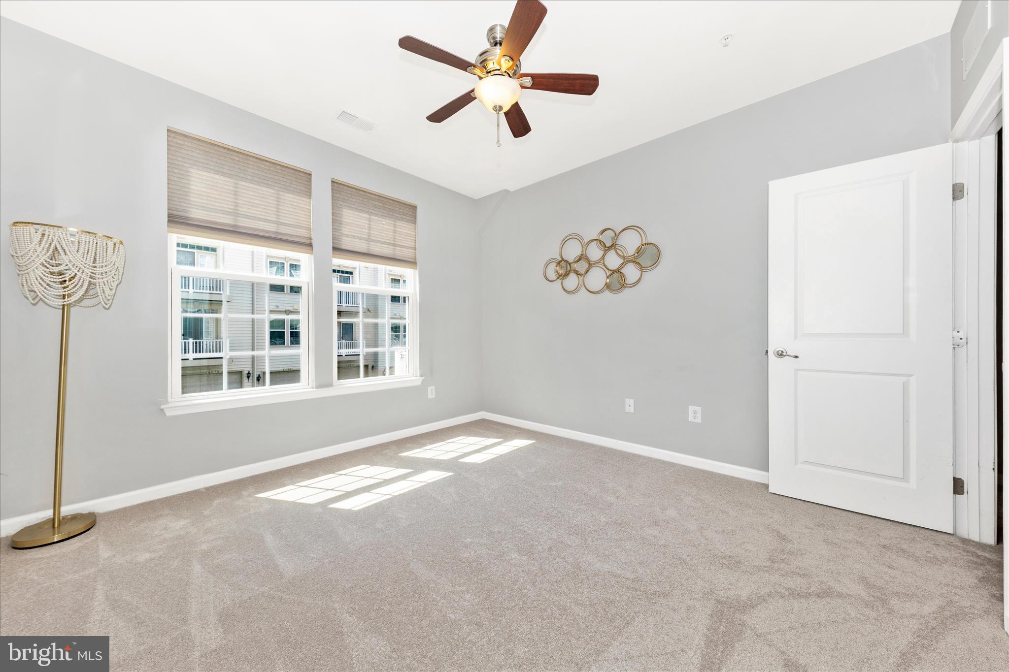 5043 Small Gains Way Frederick, MD 21703 - Photo 23 of 44 a view of an empty room with a window