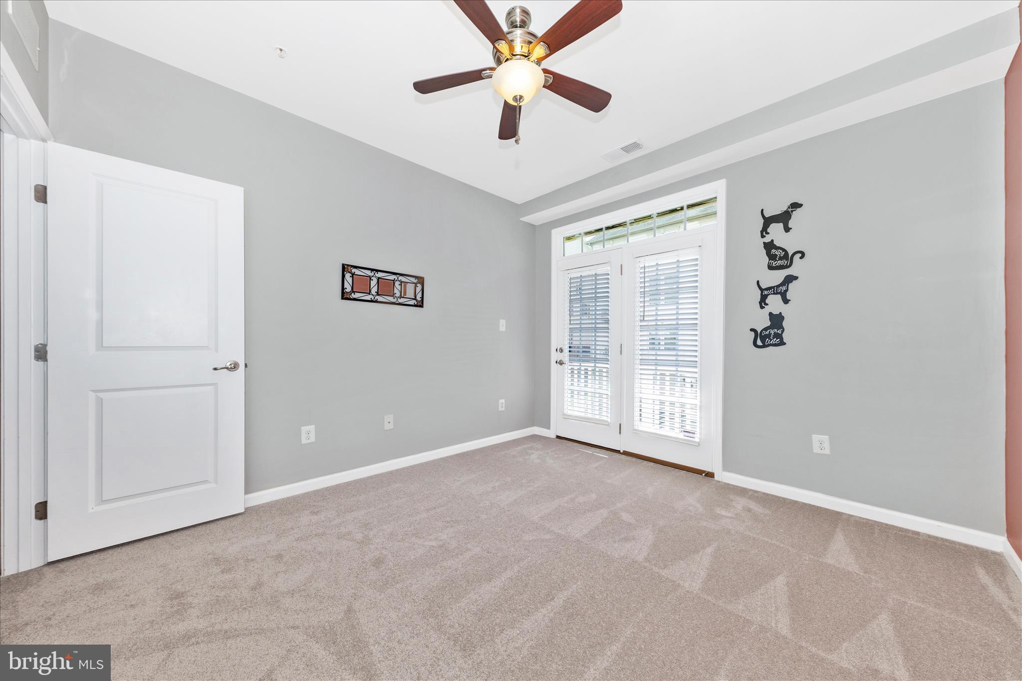 5043 Small Gains Way Frederick, MD 21703 - Photo 29 of 44 a view of an empty room with a window