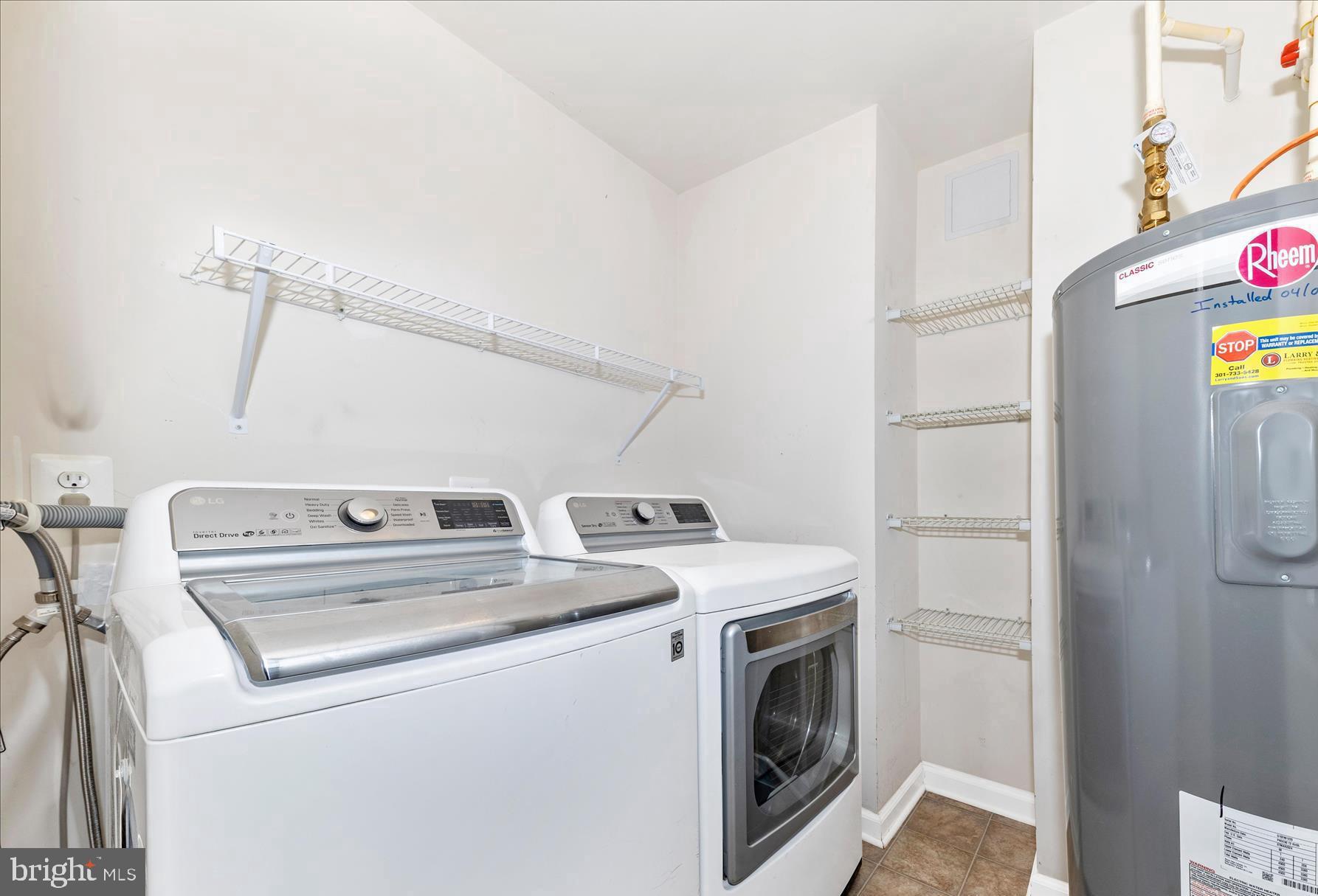 5043 Small Gains Way Frederick, MD 21703 - Photo 30 of 44 a utility room with dryer and washer