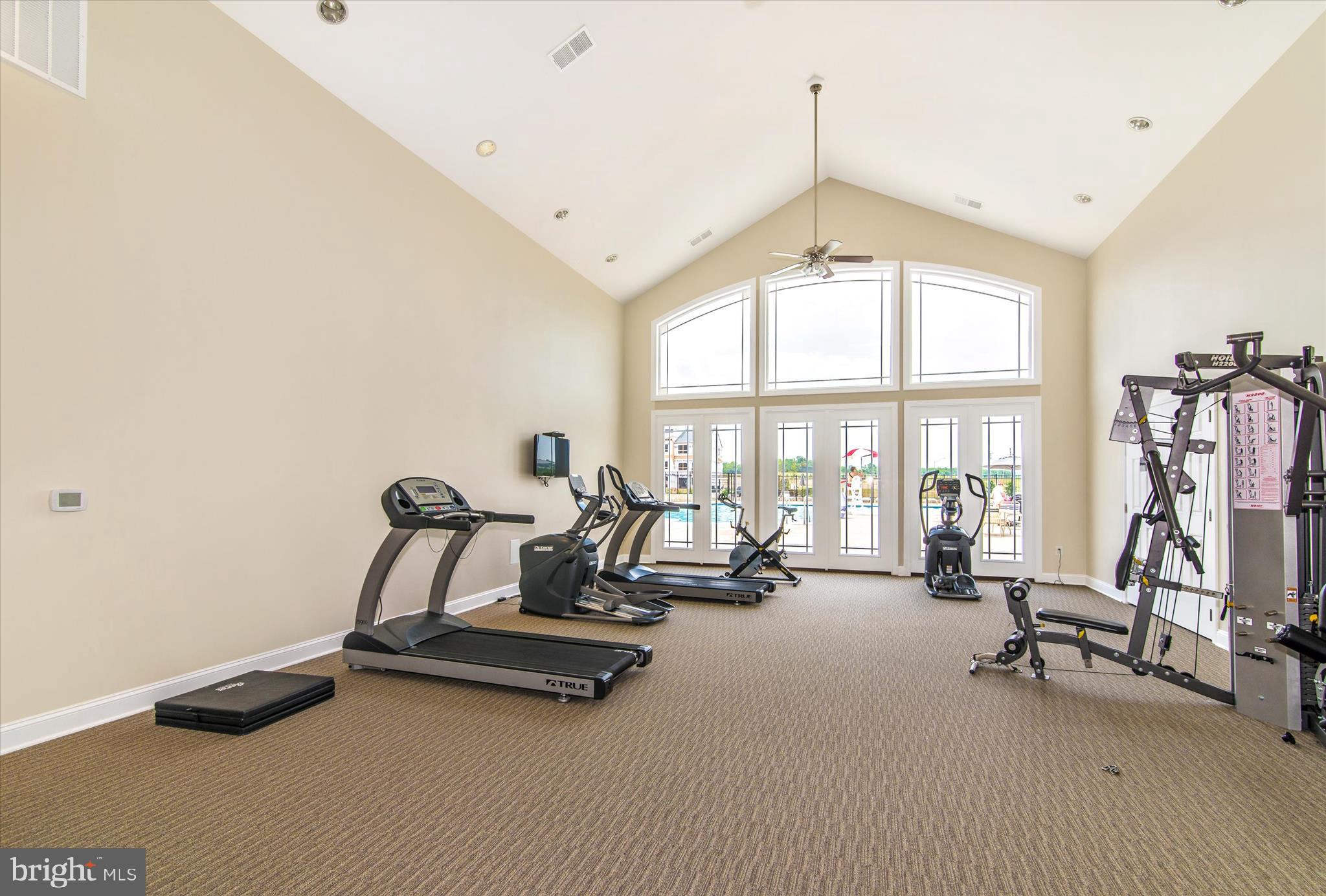 5043 Small Gains Way Frederick, MD 21703 - Photo 40 of 44 a view of a room with gym equipment