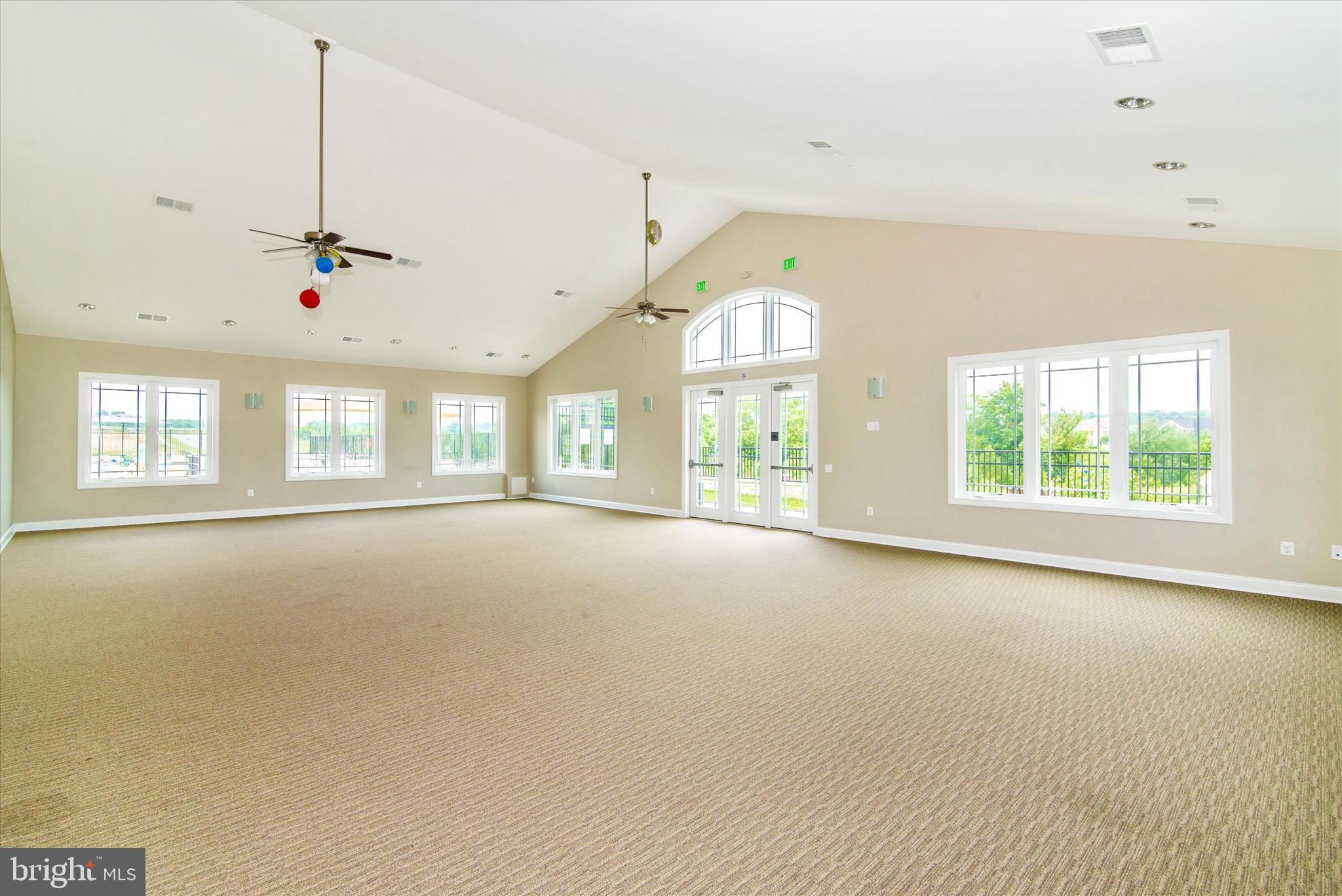 5043 Small Gains Way Frederick, MD 21703 - Photo 41 of 44 a view of an empty room with a window