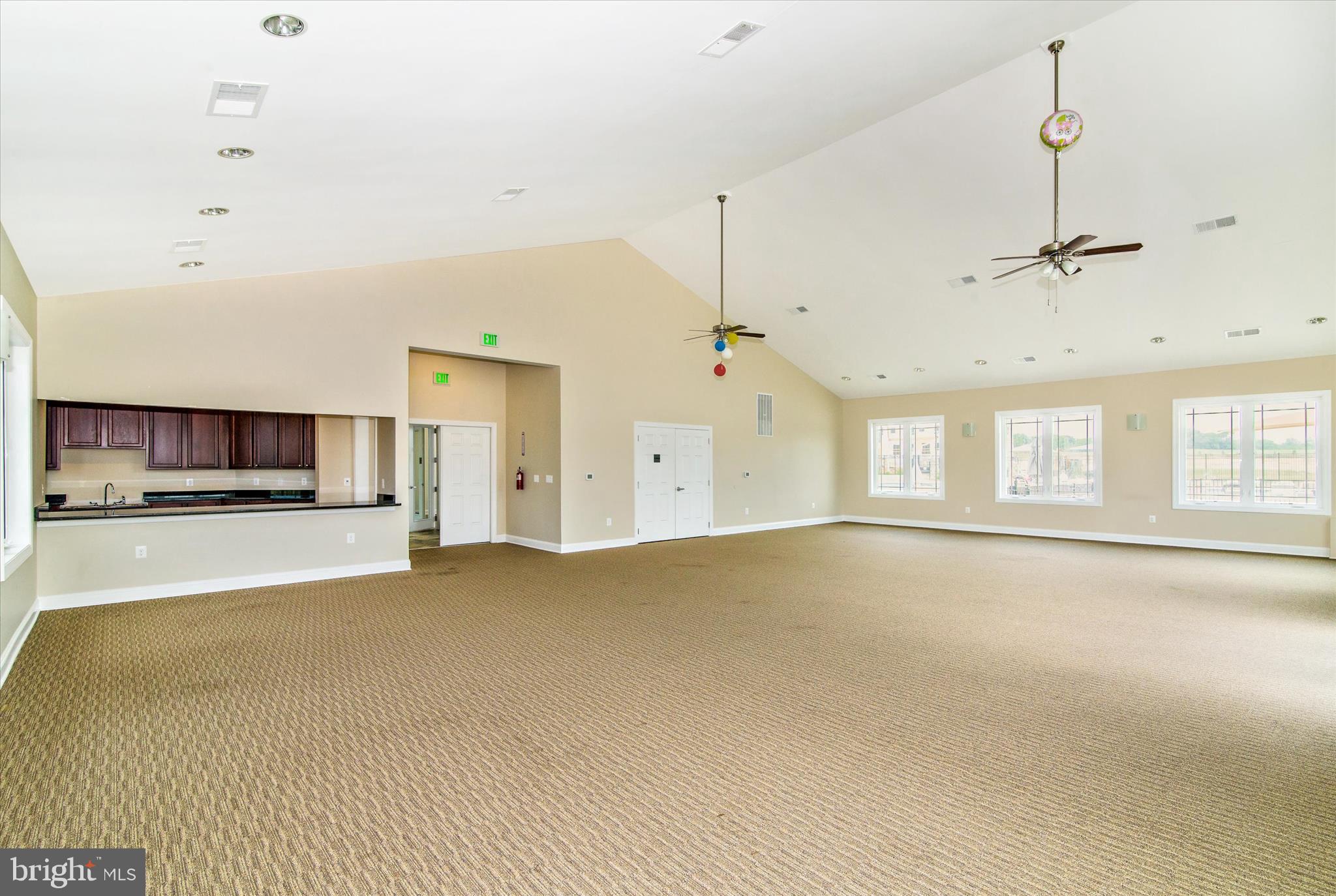 5043 Small Gains Way Frederick, MD 21703 - Photo 42 of 44 a view of an empty room with a window