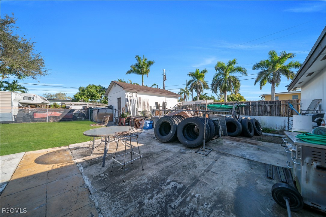 17255 Southwest 299th Street Homestead, FL 33030 - Photo 15 of 47 a view of a backyard with sitting area
