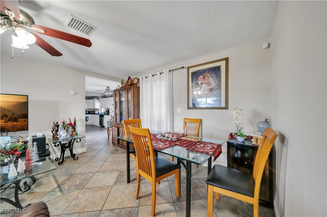 17255 Southwest 299th Street Homestead, FL 33030 - Photo 18 of 47 a view of a workspace with furniture