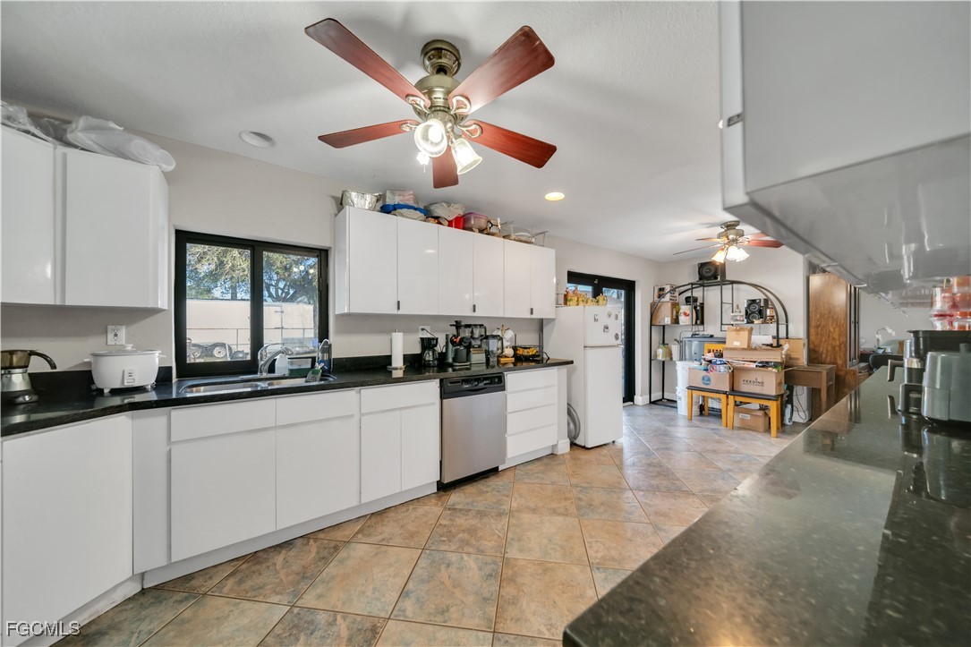17255 Southwest 299th Street Homestead, FL 33030 - Photo 22 of 47 a kitchen with stainless steel appliances lots of counter top space