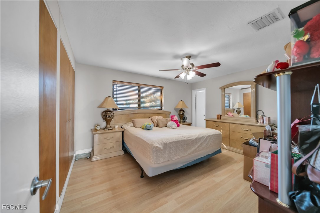 17255 Southwest 299th Street Homestead, FL 33030 - Photo 24 of 47 a living room with furniture and a flat screen tv