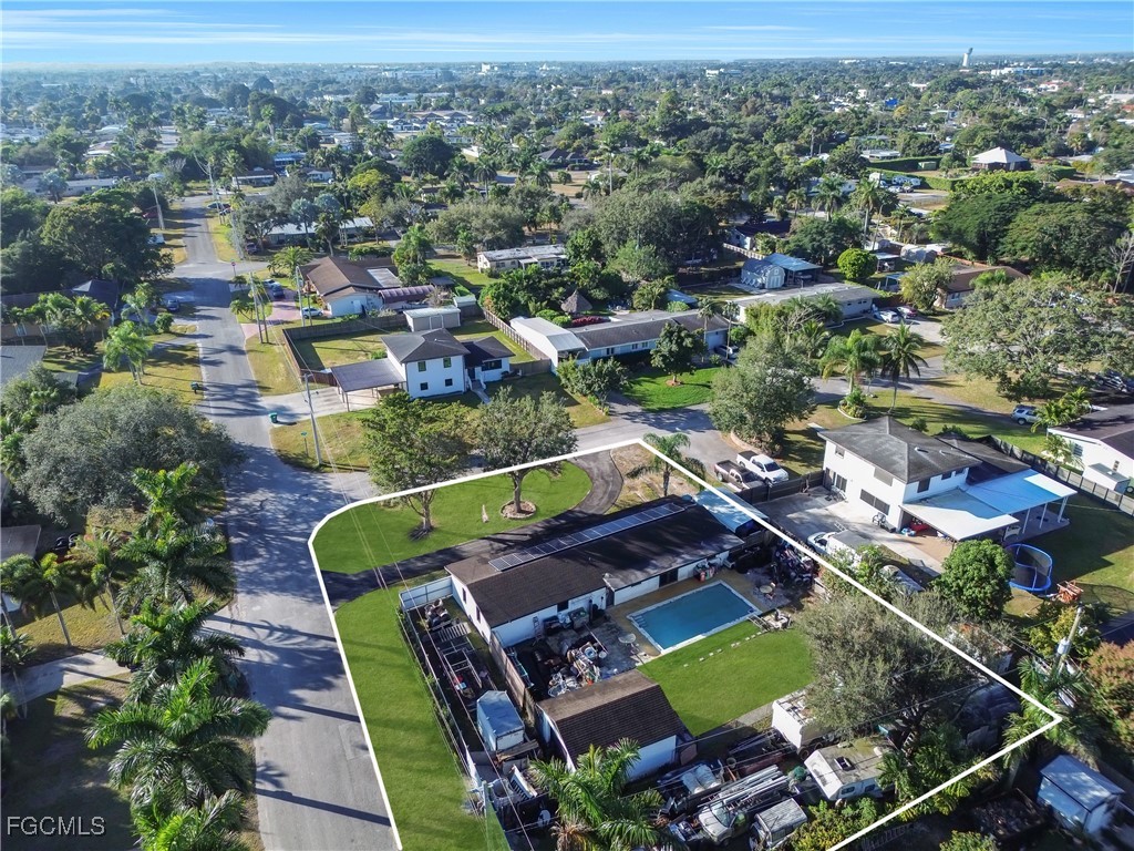 17255 Southwest 299th Street Homestead, FL 33030 - Photo 41 of 47 an aerial view of residential houses with outdoor space