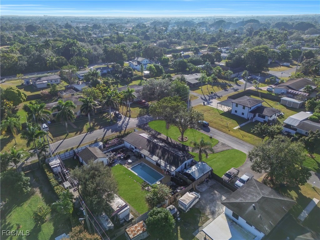 17255 Southwest 299th Street Homestead, FL 33030 - Photo 43 of 47 an aerial view of residential houses with outdoor space