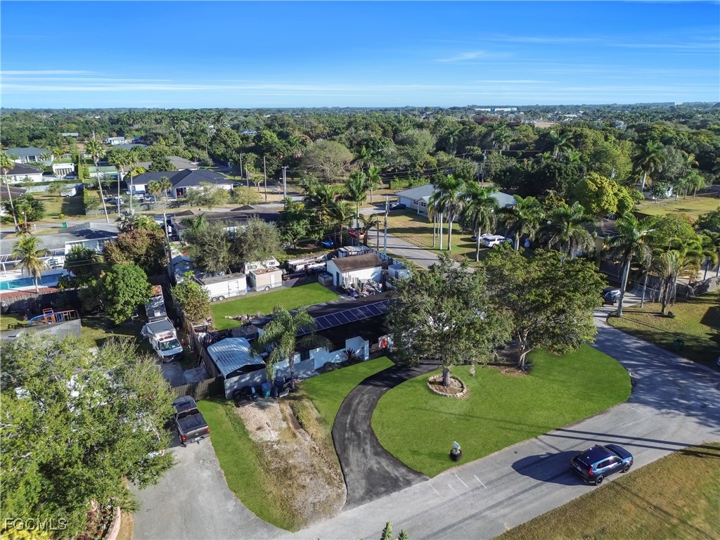 17255 Southwest 299th Street Homestead, FL 33030 - Photo 46 of 47 an aerial view of a house with a garden and swimming pool