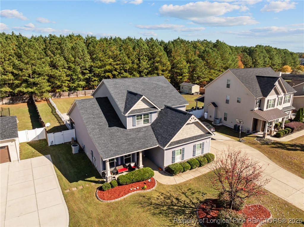 667 St Johns Loop Raeford, NC 28376 - Photo 11 of 50 an aerial view of a house with a yard