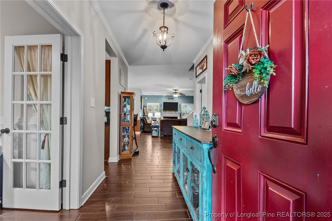 667 St Johns Loop Raeford, NC 28376 - Photo 13 of 50 a hall way with furniture and a window