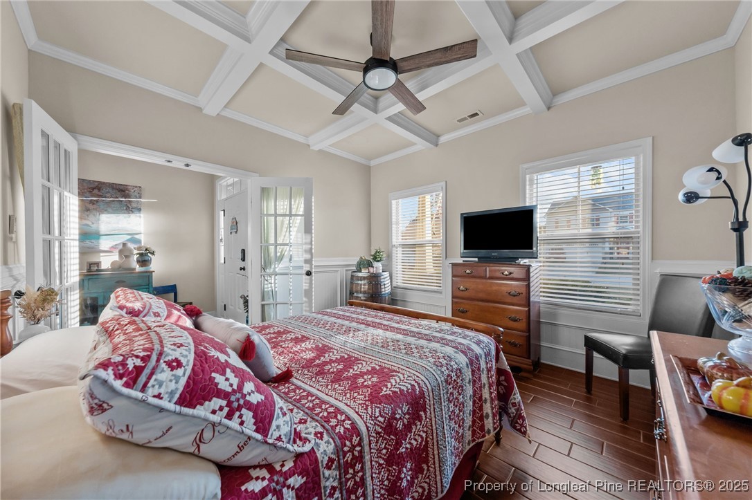 667 St Johns Loop Raeford, NC 28376 - Photo 31 of 50 a bedroom with a bed and a flat screen tv