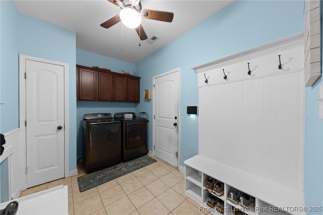 667 St Johns Loop Raeford, NC 28376 - Photo 33 of 50 a kitchen with stainless steel appliances a refrigerator and a stove top oven