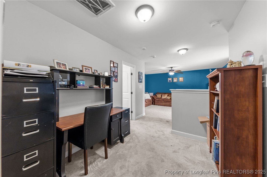 667 St Johns Loop Raeford, NC 28376 - Photo 40 of 50 a kitchen with stainless steel appliances a refrigerator and a stove top oven