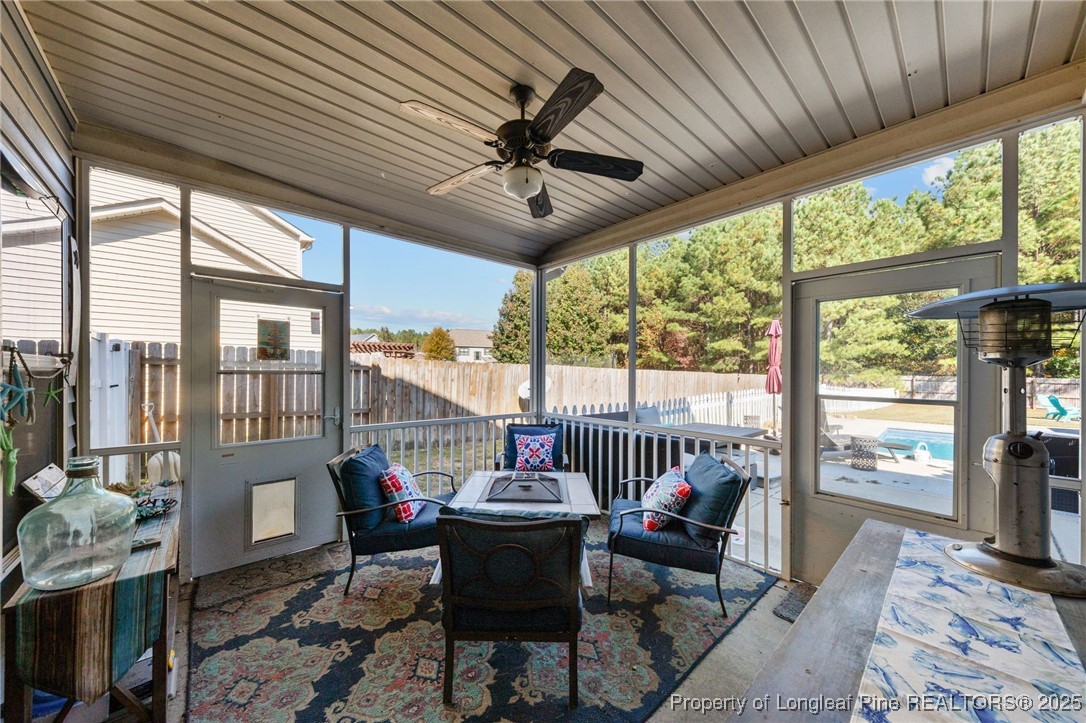 667 St Johns Loop Raeford, NC 28376 - Photo 43 of 50 a living room with furniture and a large window