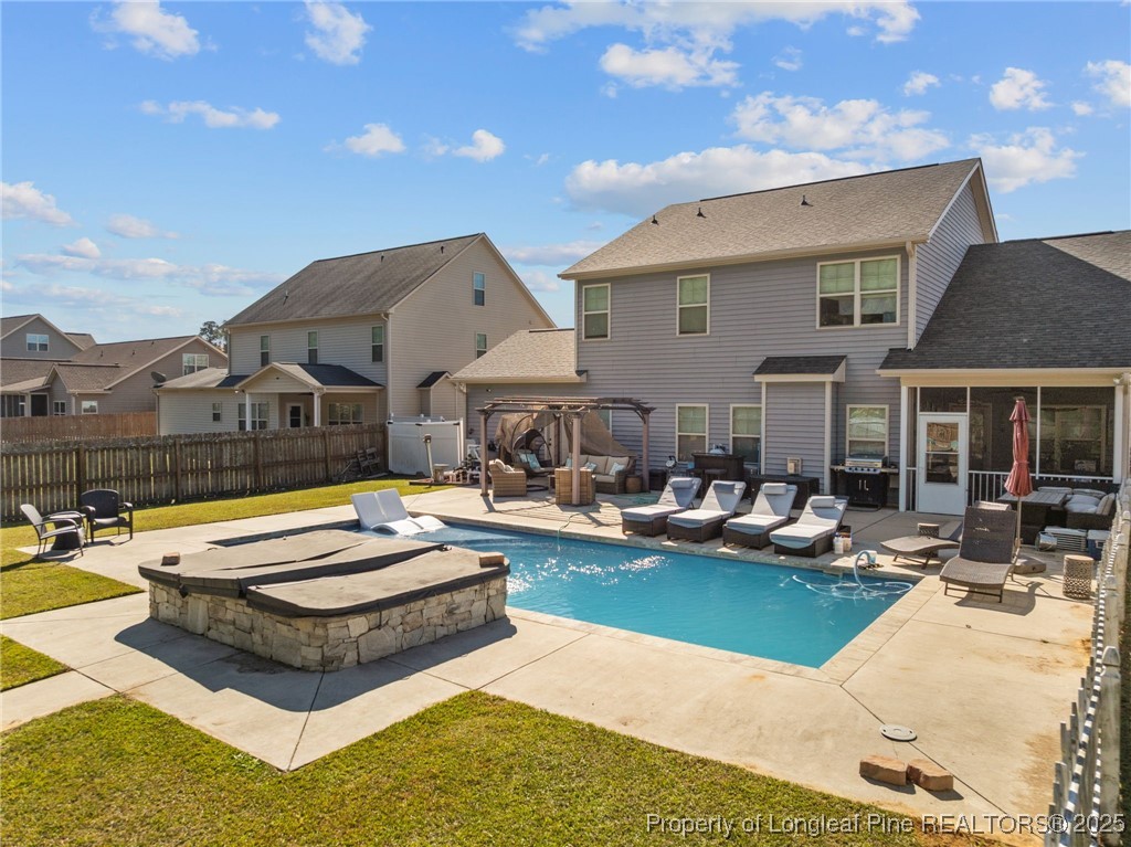 667 St Johns Loop Raeford, NC 28376 - Photo 47 of 50 a view of a patio with couches and pool table and chairs