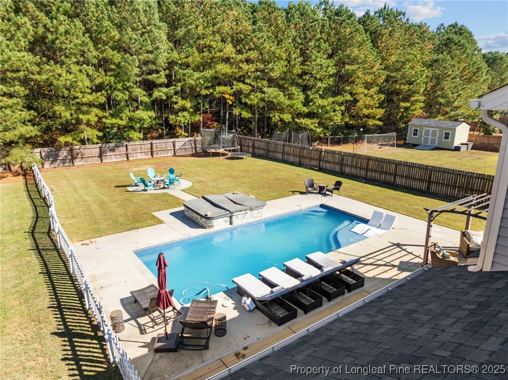 667 St Johns Loop Raeford, NC 28376 - Photo 50 of 50 a view of swimming pool with seating space