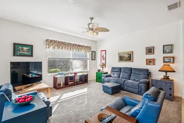 a workspace with furniture and a window