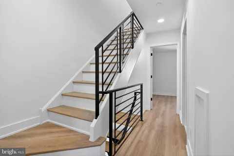 a view of entryway with wooden floor