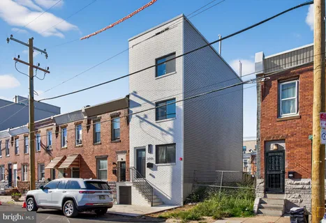 a car parked in front of a building