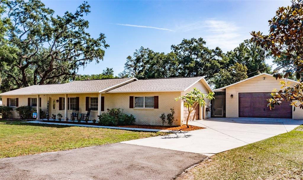 307 West Wheeler Road Seffner, FL 33584 - Photo 1 of 1 Front of Home/Detached Garage from SW angle