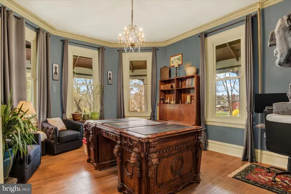 a kitchen with stainless steel appliances granite countertop a stove and a refrigerator