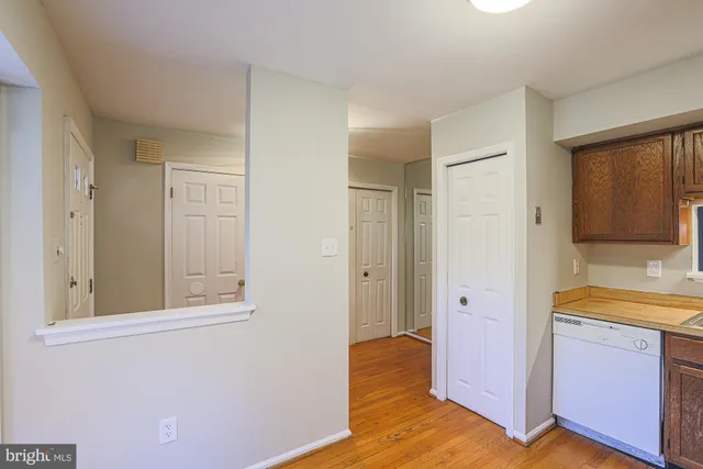 a view of a bathroom with a tub and shower