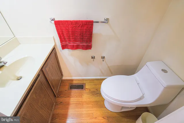 a bathroom with a toilet and a sink