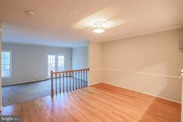 a view of a livingroom with wooden floor