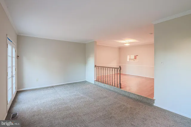 a view of a livingroom with a floor to ceiling window