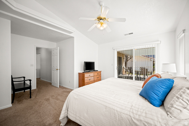 1825 West Mathis Park Place, Unit 46 St. George, UT 84770 - Photo 23 of 45 Carpeted bedroom featuring lofted ceiling, access to outside, and a ceiling fan