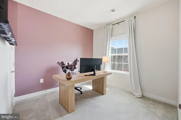 a bedroom with furniture and a bed