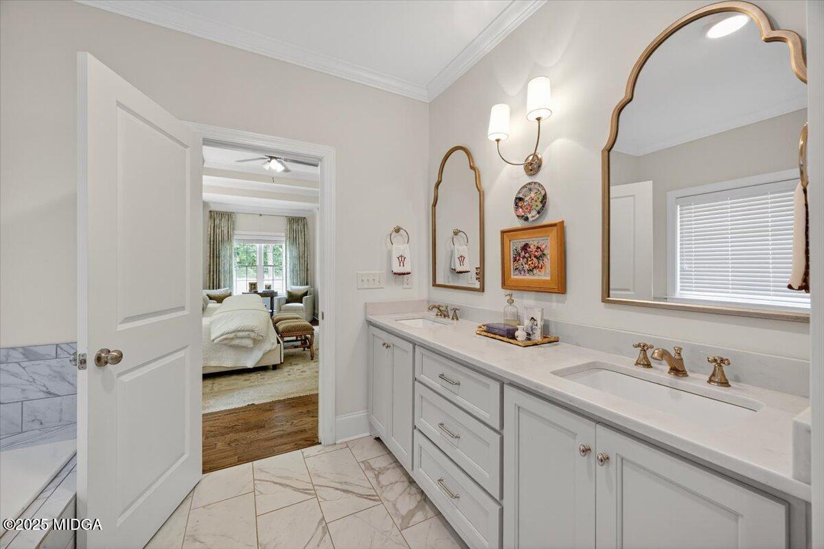 178 Broadleaf Drive Macon, GA 31210 - Photo 20 of 45 a en suite bathroom with a double vanity sink mirror and