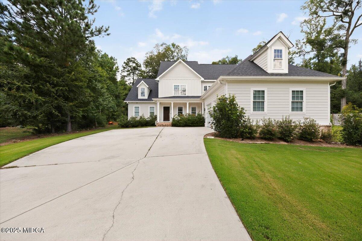 178 Broadleaf Drive Macon, GA 31210 - Photo 2 of 45 a view of house with a yard and potted plants