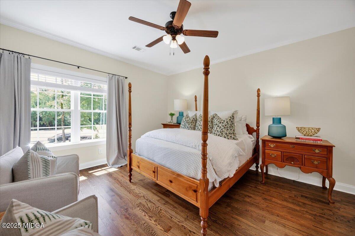 178 Broadleaf Drive Macon, GA 31210 - Photo 22 of 45 a bedroom with a bed and wooden floor