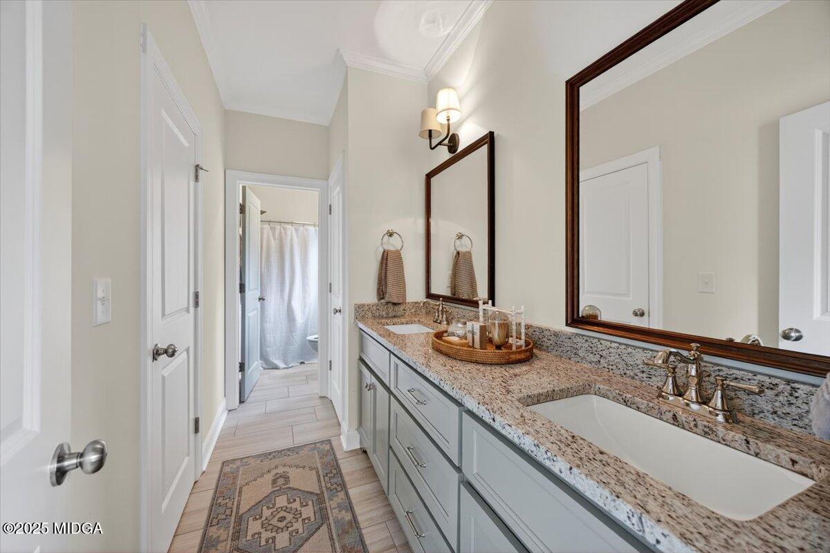 178 Broadleaf Drive Macon, GA 31210 - Photo 29 of 45 a bathroom with double vanity sinks and a mirror