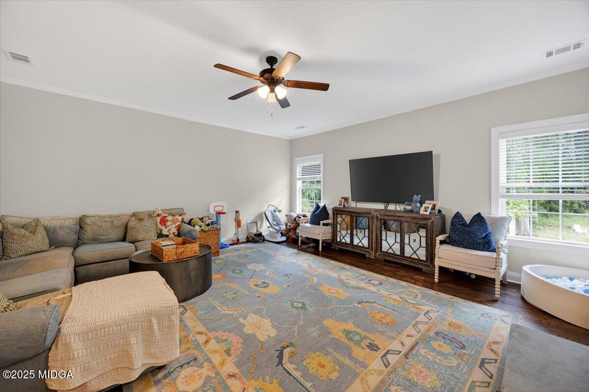 178 Broadleaf Drive Macon, GA 31210 - Photo 30 of 45 a living room with furniture and a flat screen tv