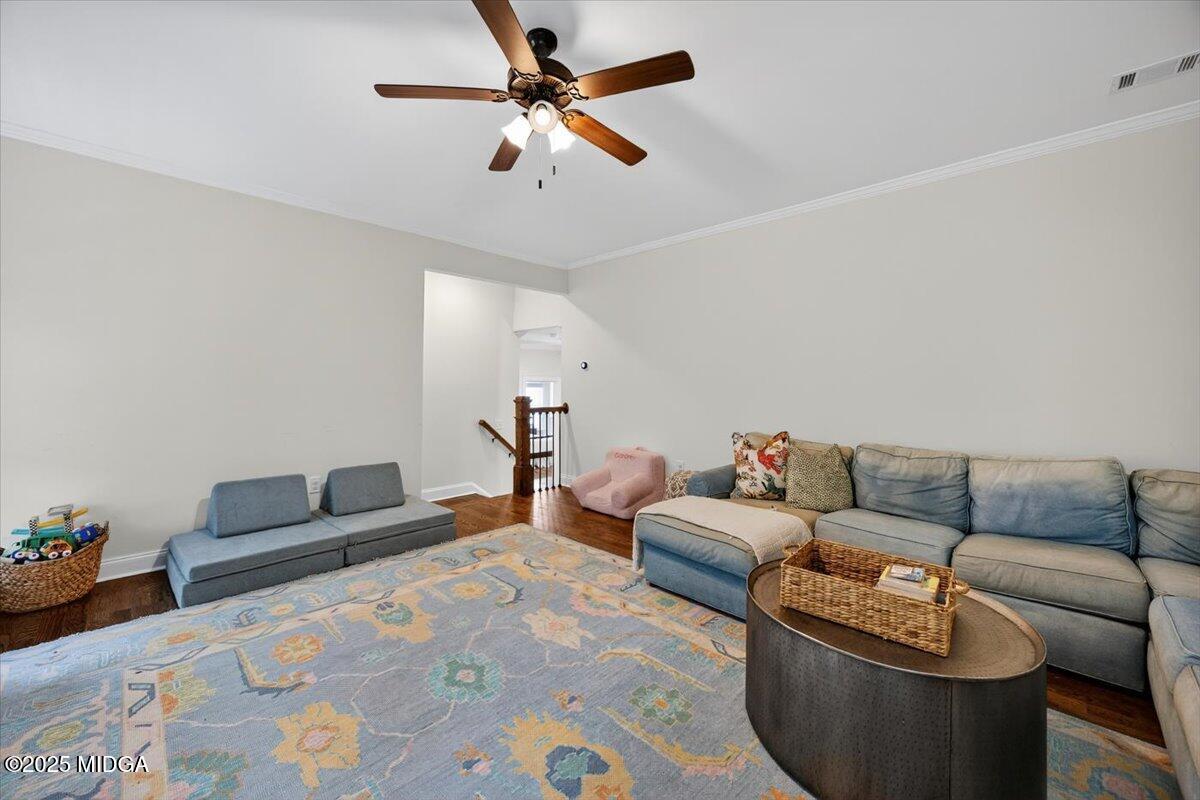 178 Broadleaf Drive Macon, GA 31210 - Photo 31 of 45 a living room with furniture and a ceiling fan