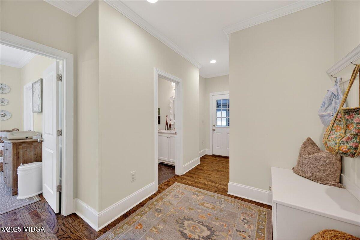 178 Broadleaf Drive Macon, GA 31210 - Photo 33 of 45 a view of a hallway to rooms and wooden floor