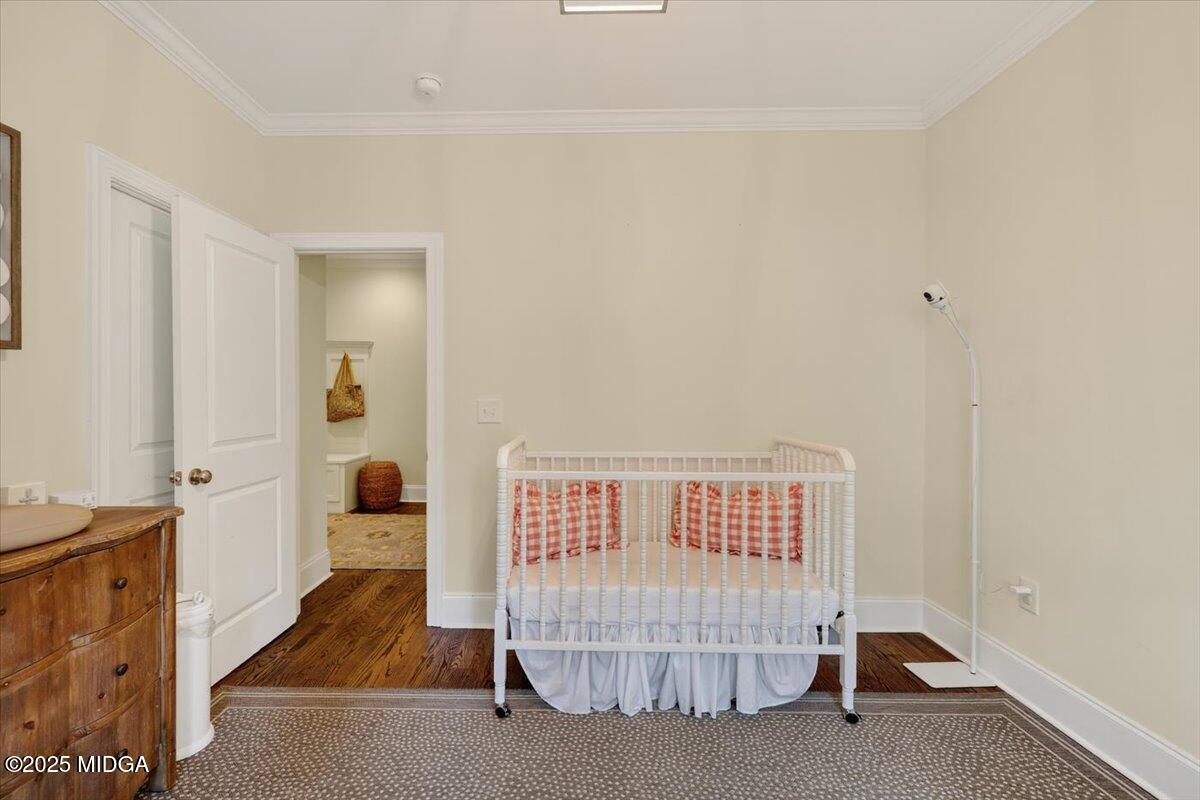 178 Broadleaf Drive Macon, GA 31210 - Photo 37 of 45 a bedroom with a bed and the couch