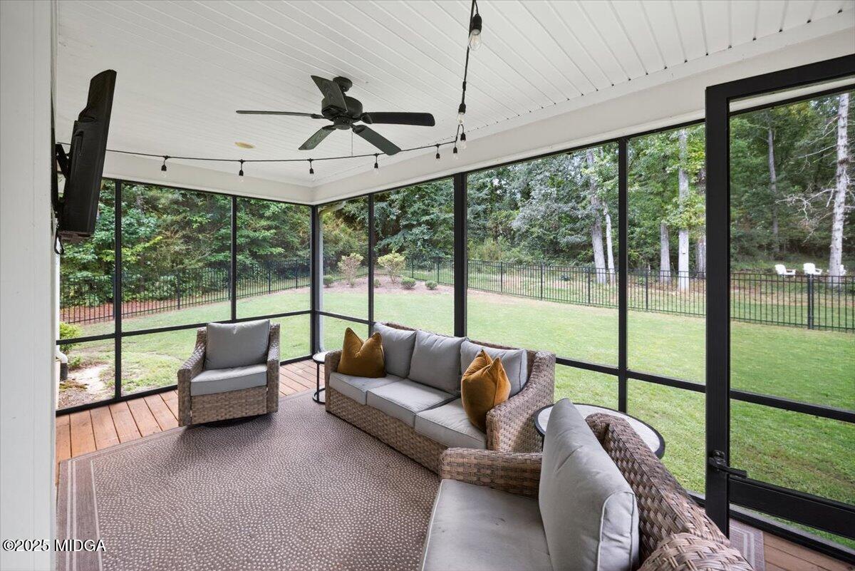 178 Broadleaf Drive Macon, GA 31210 - Photo 38 of 45 a living room with furniture and a floor to ceiling window