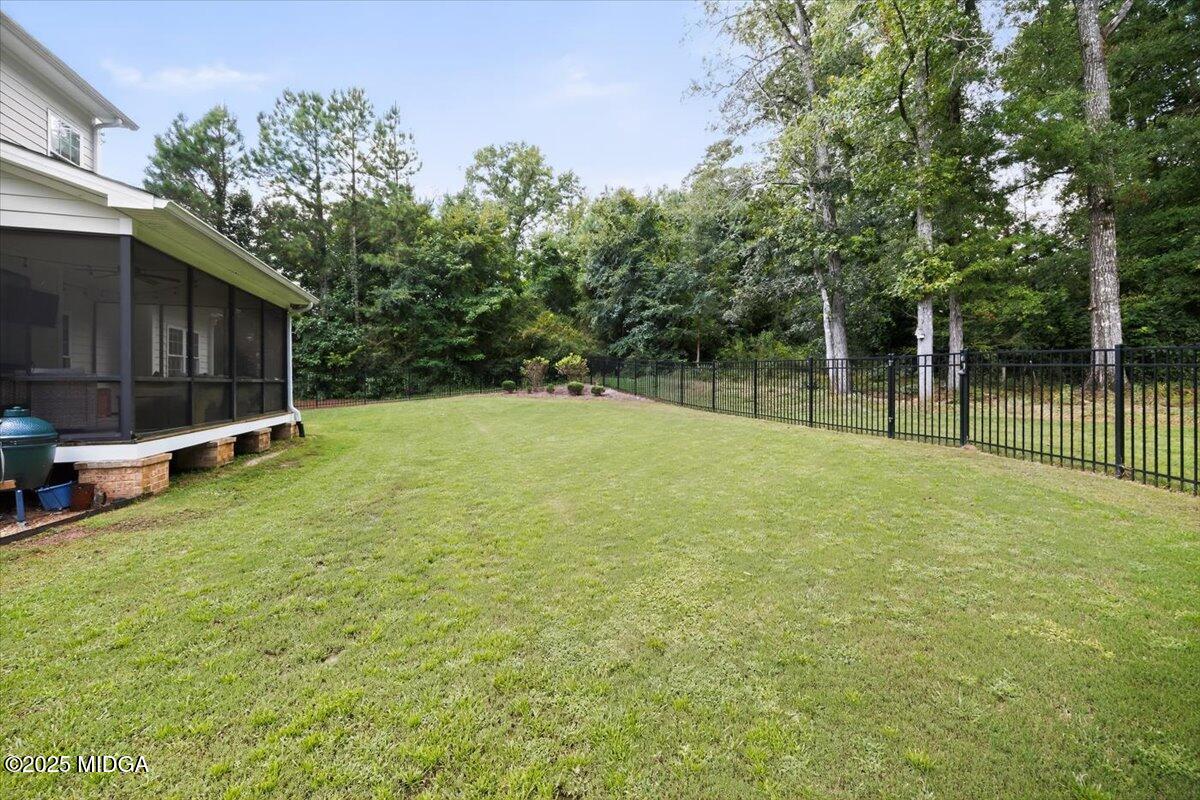178 Broadleaf Drive Macon, GA 31210 - Photo 40 of 45 a view of a backyard with a small cabin