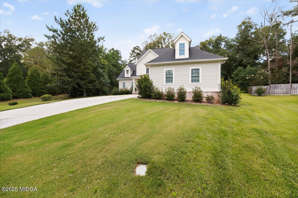 178 Broadleaf Drive Macon, GA 31210 - Photo 45 of 45 a front view of a house with yard and green space
