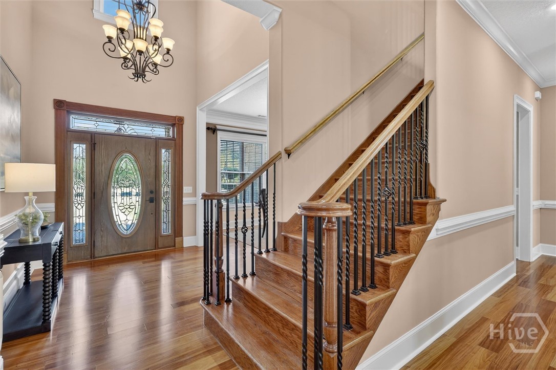 197 Cubbedge Drive Rincon, GA 31326 - Photo 16 of 43 Grand Foyer with stairwell to Guest Suites