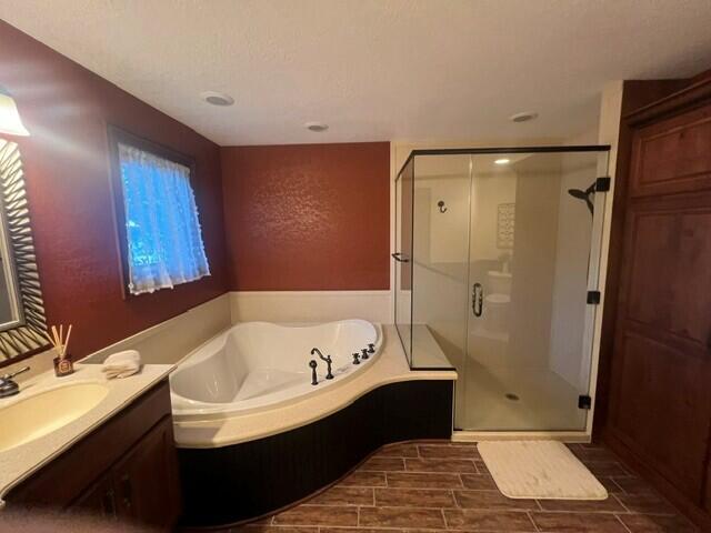 7325 West Wind Lake Road Waterford, WI 53185 - Photo 30 of 69 Large Jetted Tub & Handicapped Accessible Walk-In Shower With Bench For Sitting