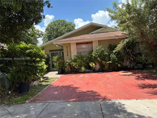 a front view of a house with yard