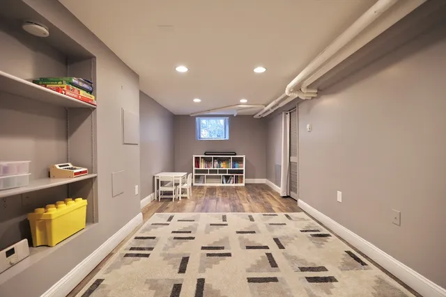 a view of a kitchen with wooden floor